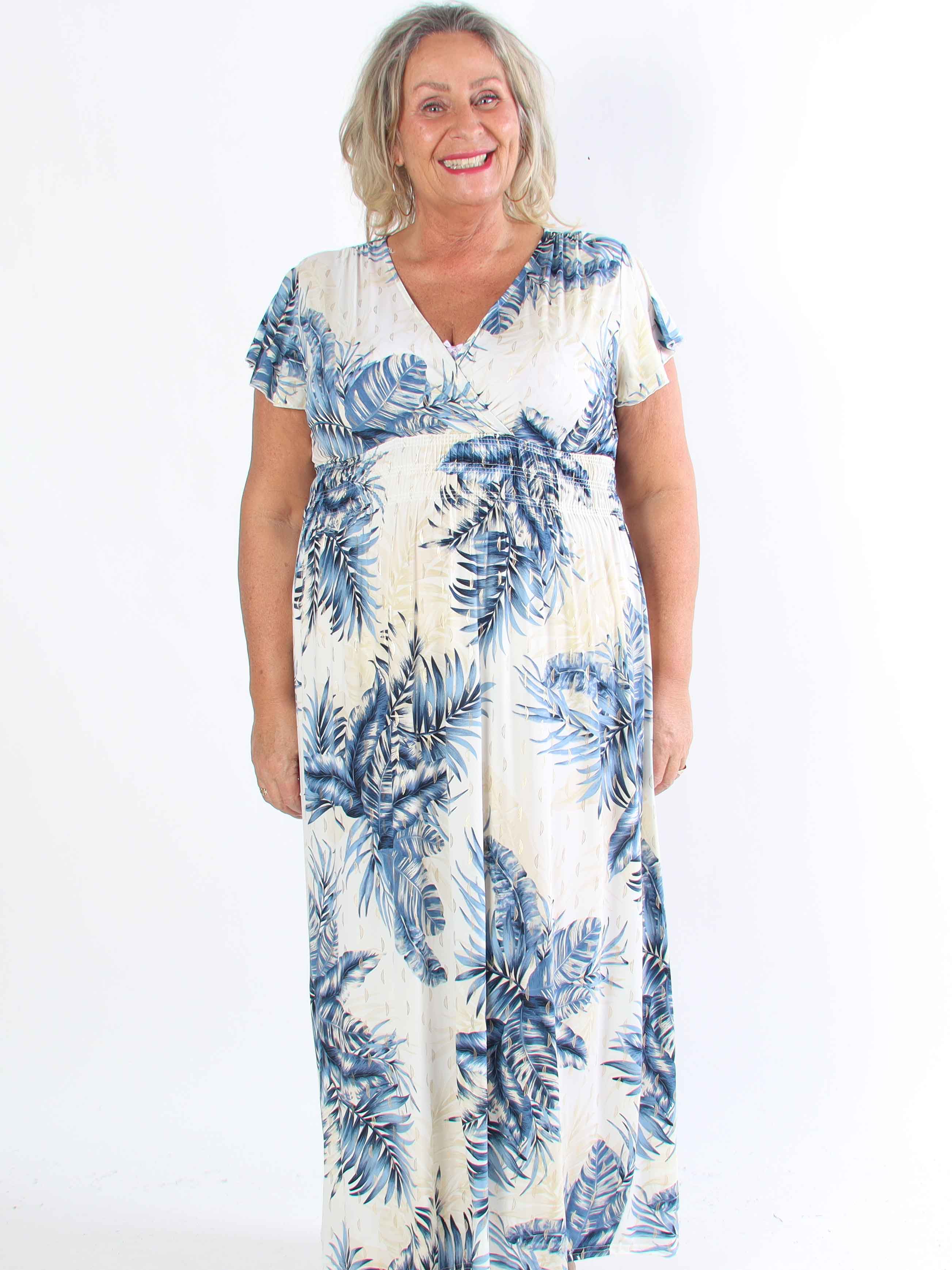 Palma - Elastisk klänning i plus size med blad och volangärmar